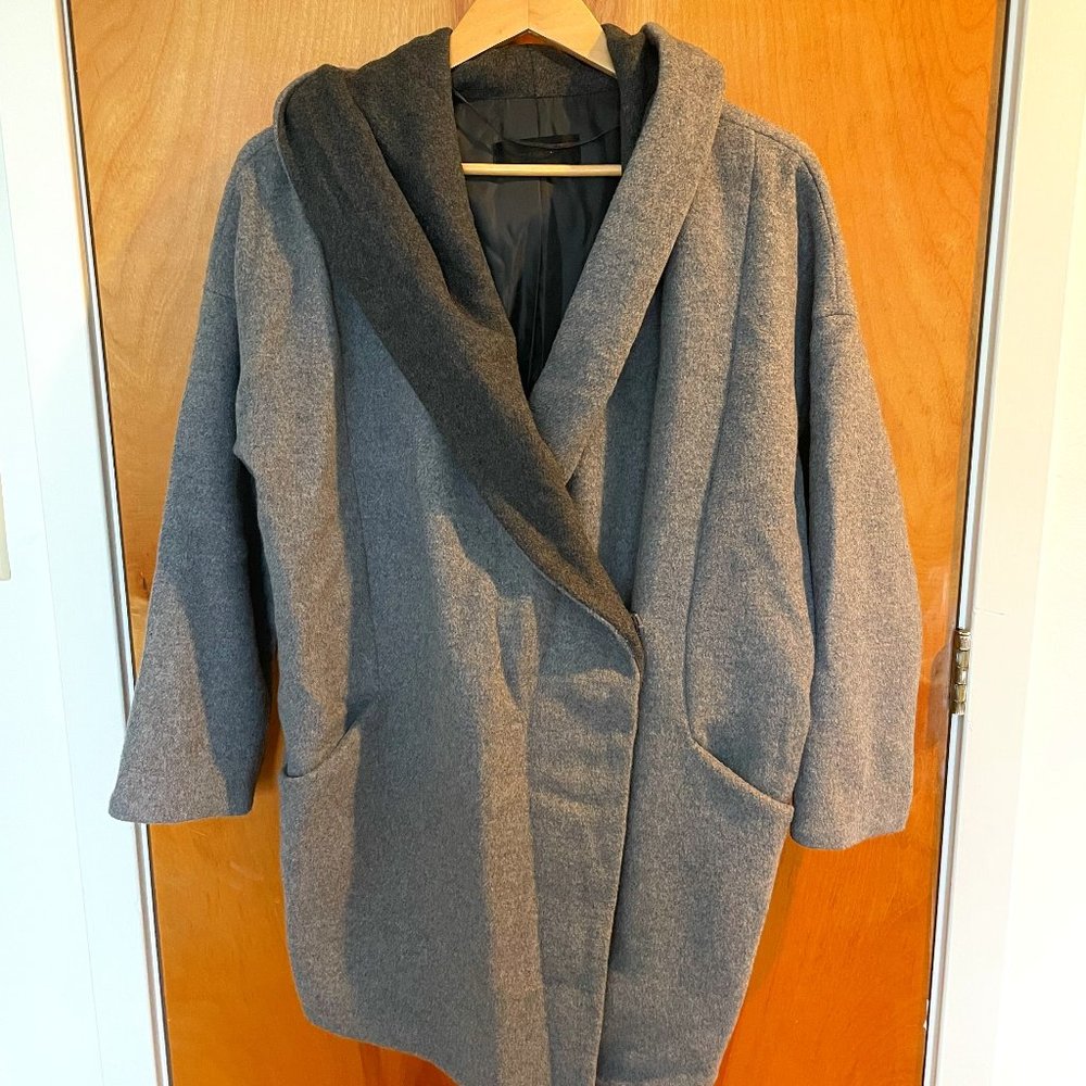 Jacket with a built in hood